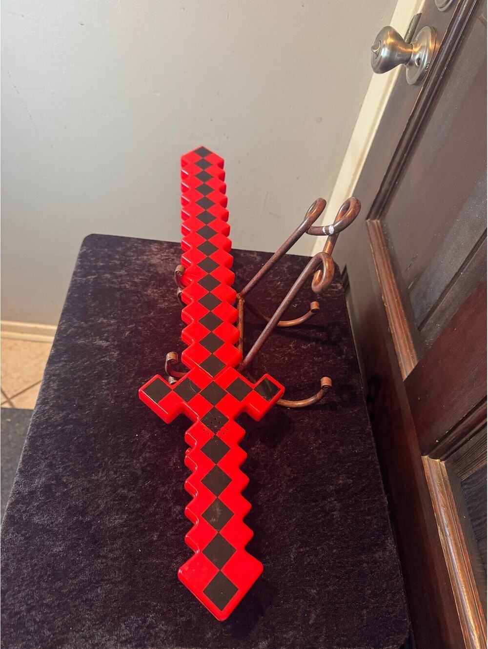 Pixelated Red and Black Plastic Sword